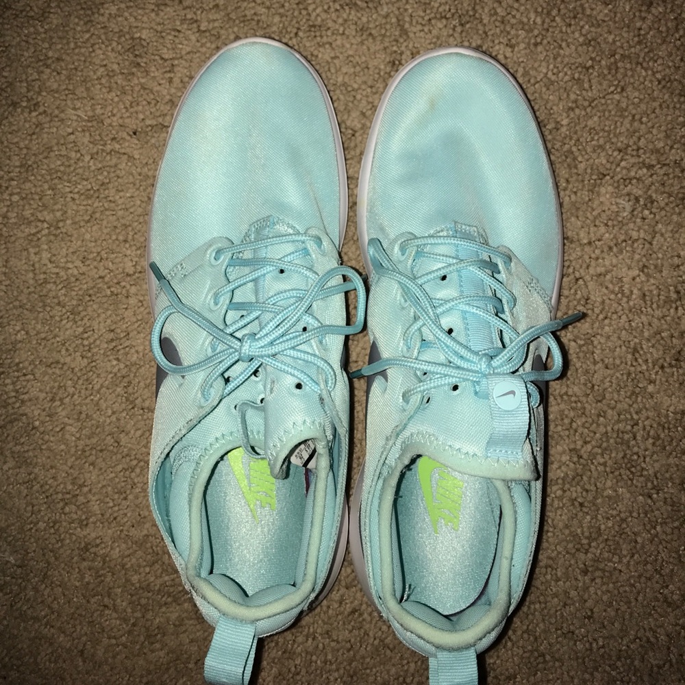 Light blue/teal Nike Roches